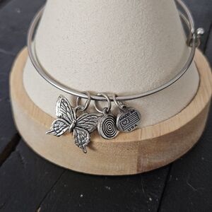 Clea Ray Chic Silver Charm Bracelet with Butterfly and Spiral